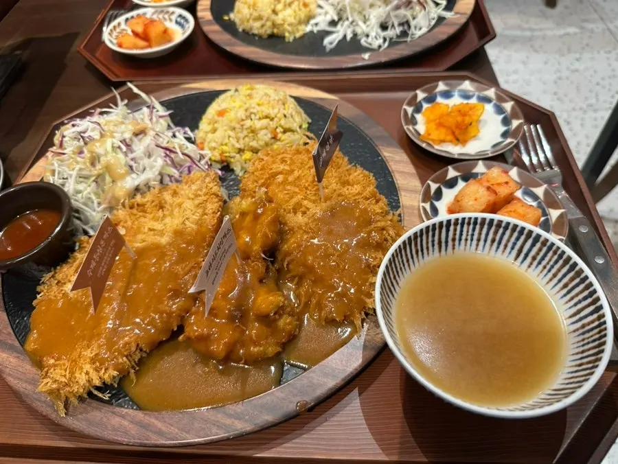 Gyewondang chicken cutlet served as a full table setting