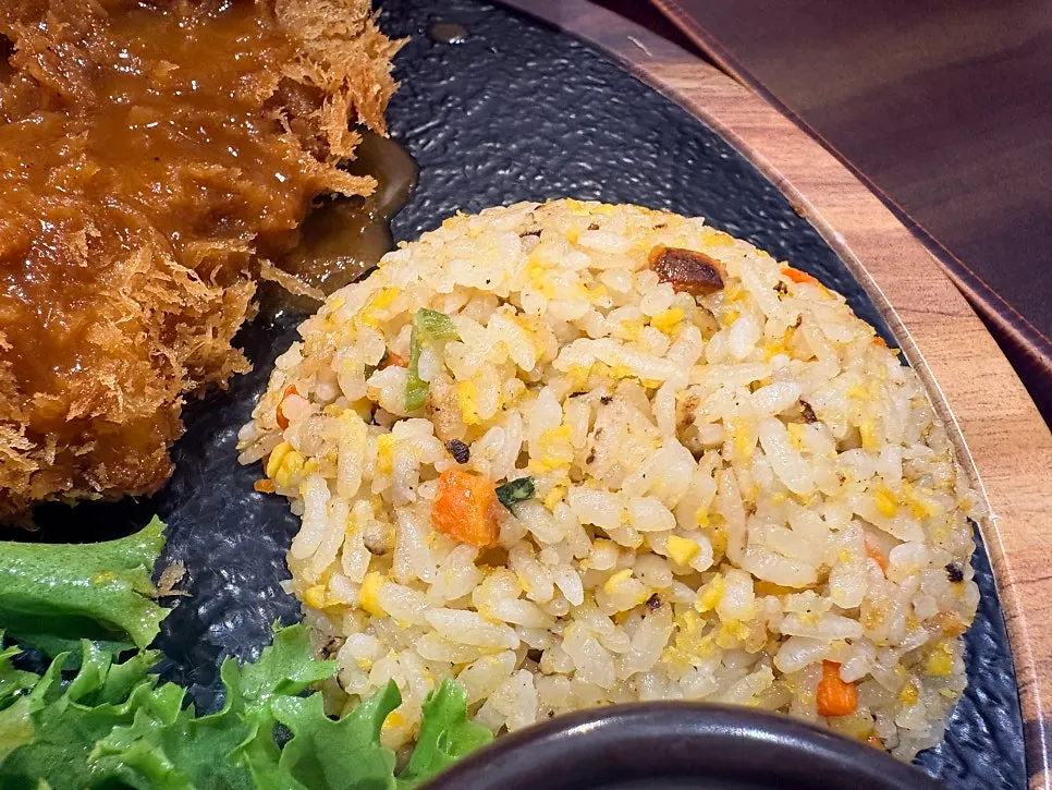 Seasoned danmuji and cutlet on the stone-slab plate