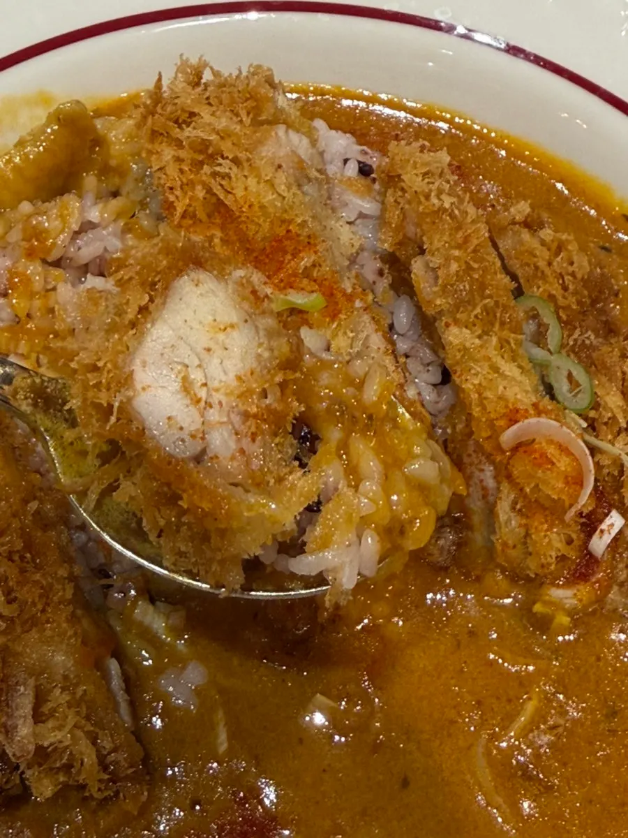 Full table spread of pork cutlet curry and the Gyewon Set