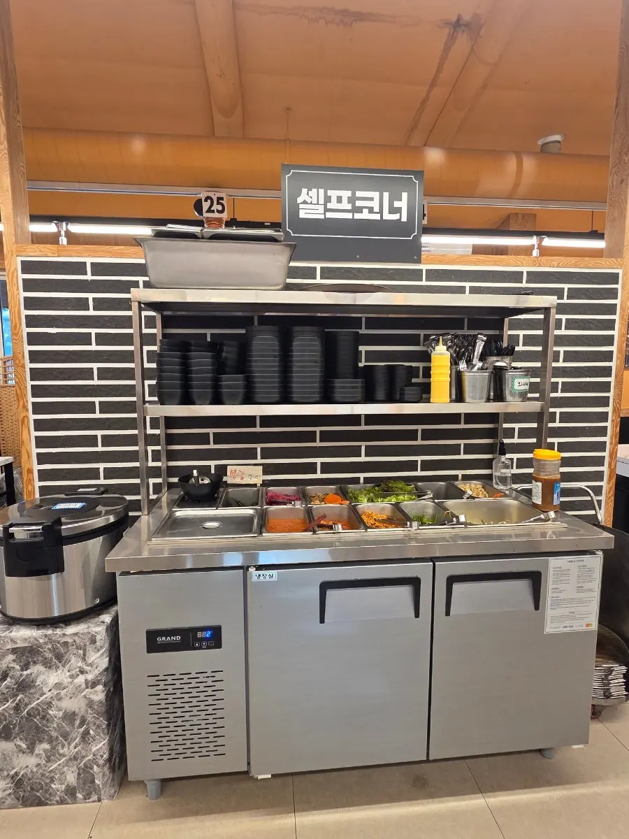 Self-serve corner with disposable aprons and sweet potato bags