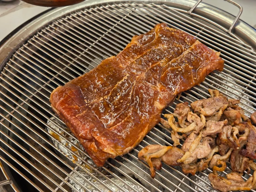 Seasoned pork ribs rolled around the bone
