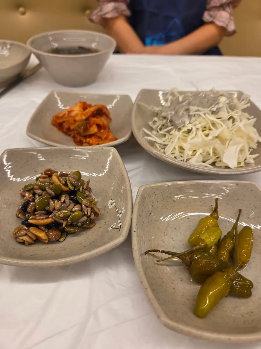 Basic side dishes: cabbage salad, kimchi, and seaweed soup