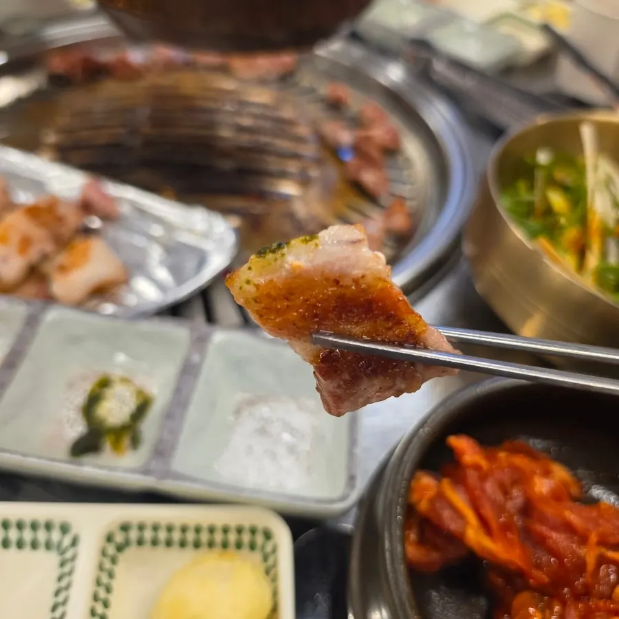An evening meal with charcoal-grilled meat