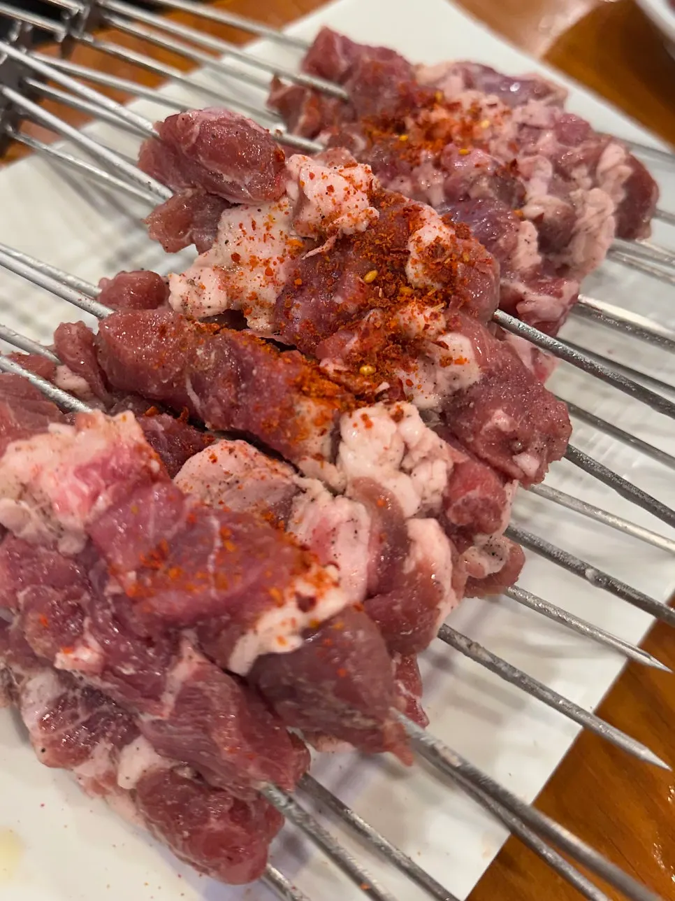 Ordered lamb skewers on the table