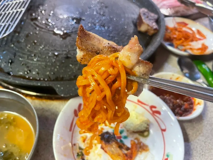 Thin-sliced pork belly with Buldak 볶음면