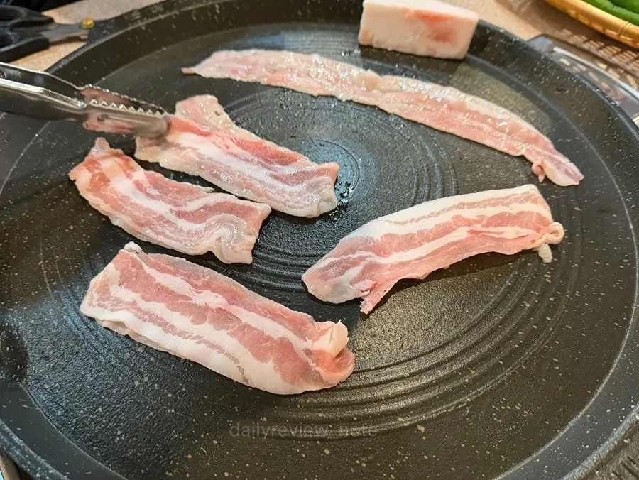 Thin-sliced pork and grill ready to cook