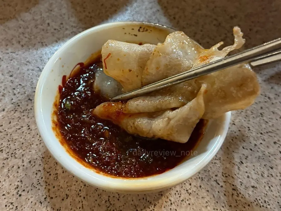 Golden grilled kimchi and thin-sliced pork