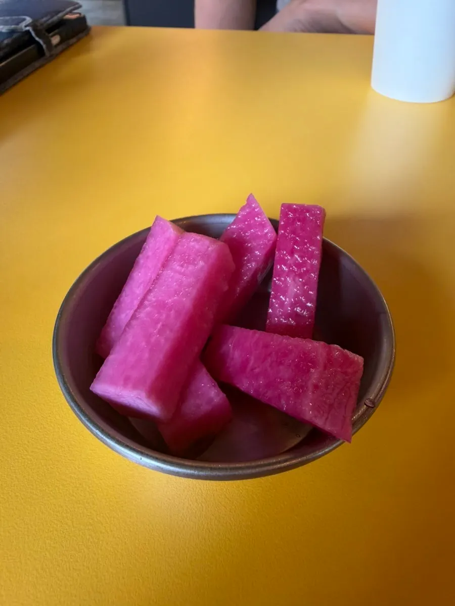 Self-serve bar corner with crunchy pickles