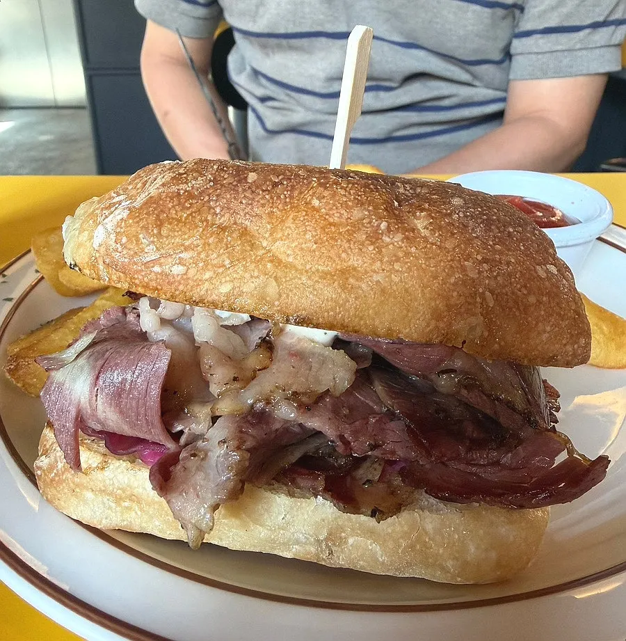 Sourdough sandwich packed with pastrami