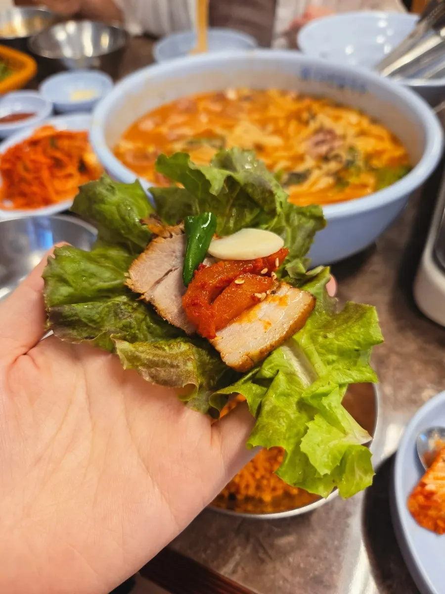 Boiled pork wrapped with bossam kimchi