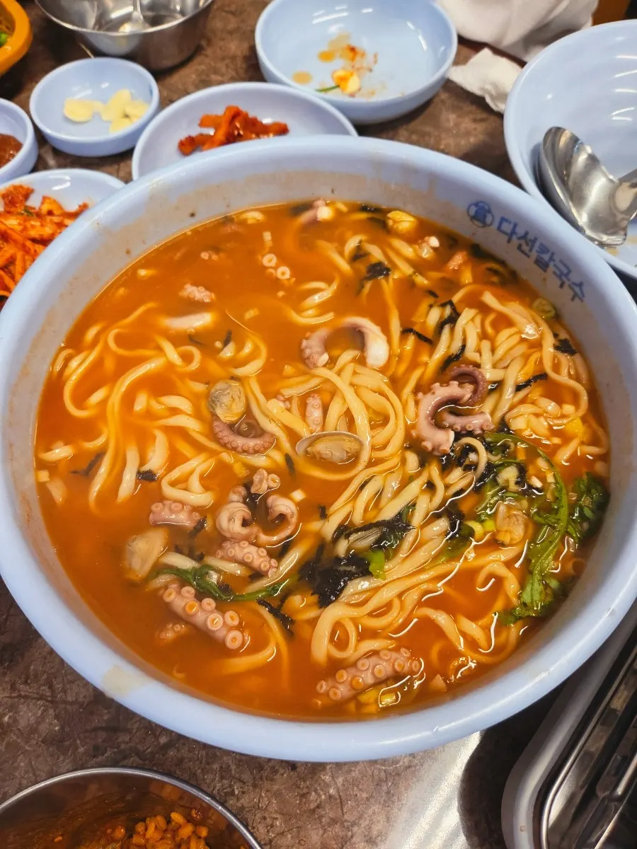 Chewy kalguksu noodles in the spicy octopus broth