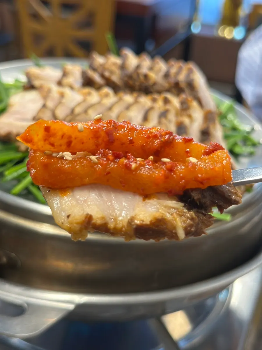 Bossam paired with house-made kimchi