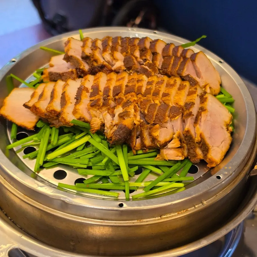 Spicy octopus and stir-fried vegetables cut with scissors