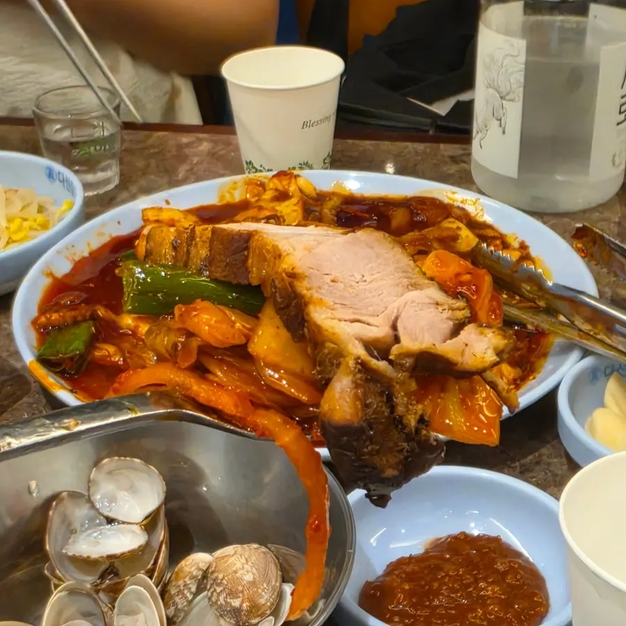Bossam wrapped with kimchi on top
