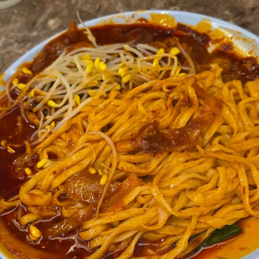 Daseon Kalguksu's knife-cut noodles drizzled with sesame oil