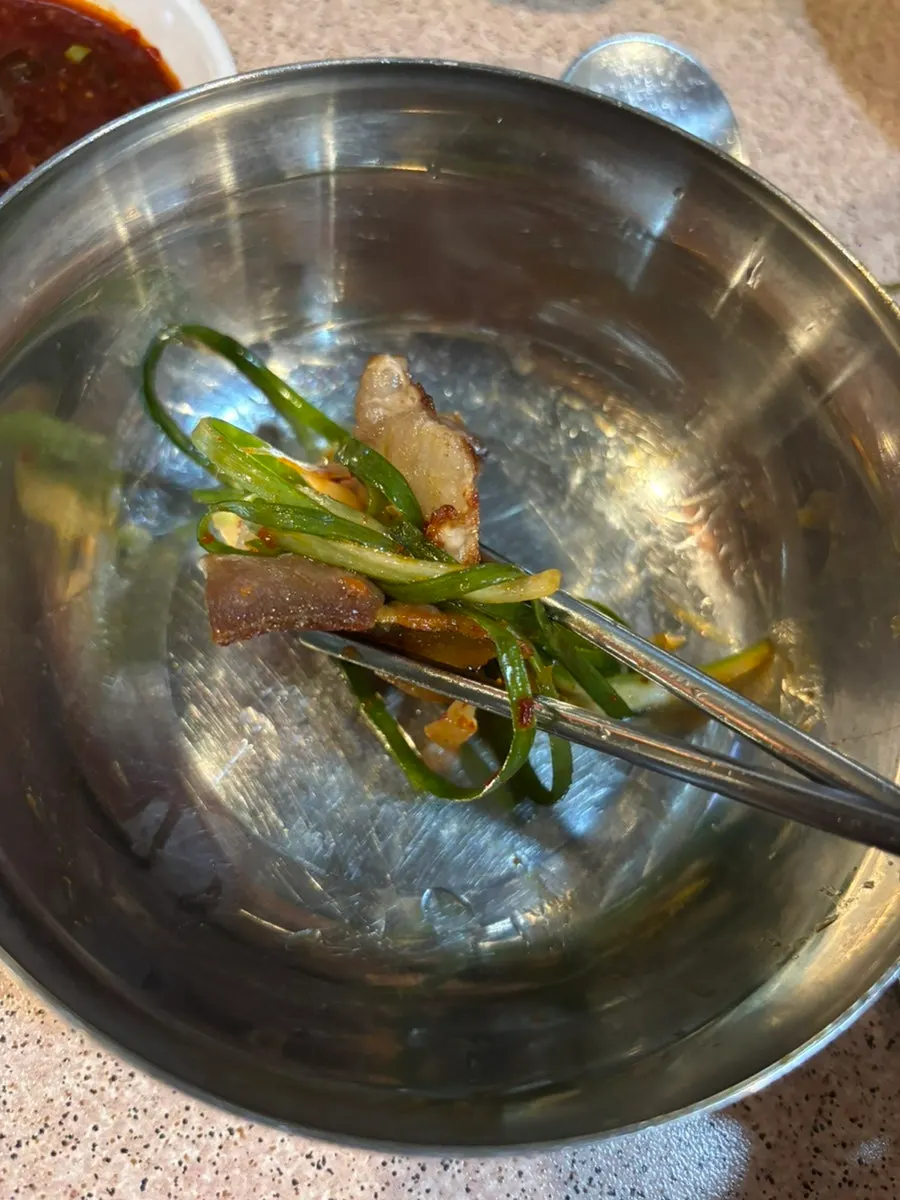 Gyodaepae's egg custard topped with sesame seeds and scallions