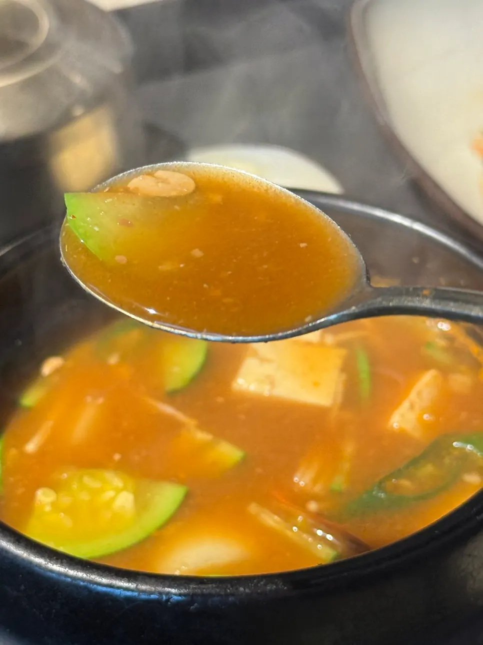 Doenjang-jjigae broth enjoyed with grilled meat