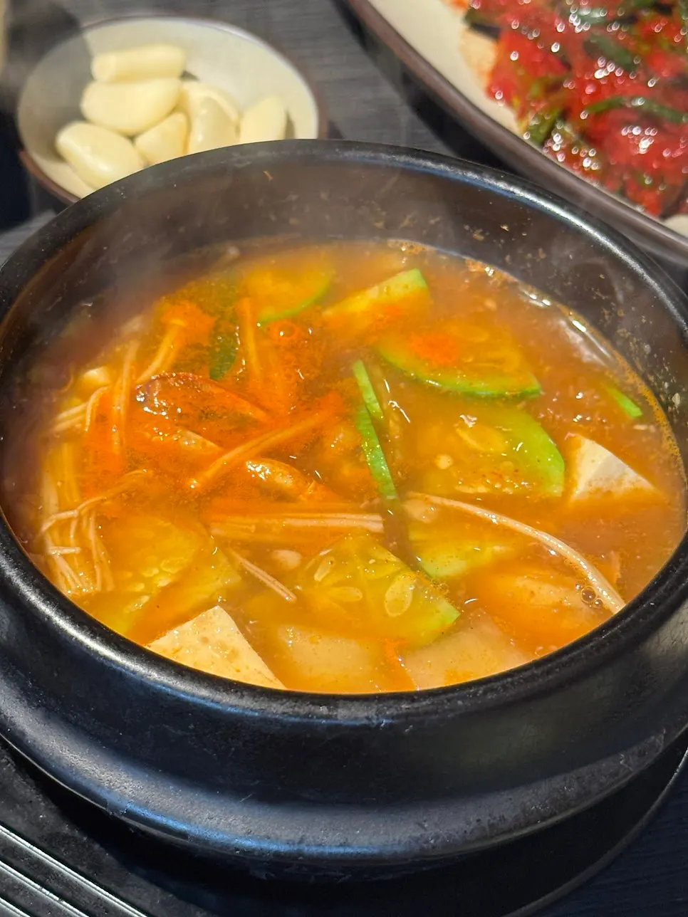 A stew generously filled with tofu and vegetables