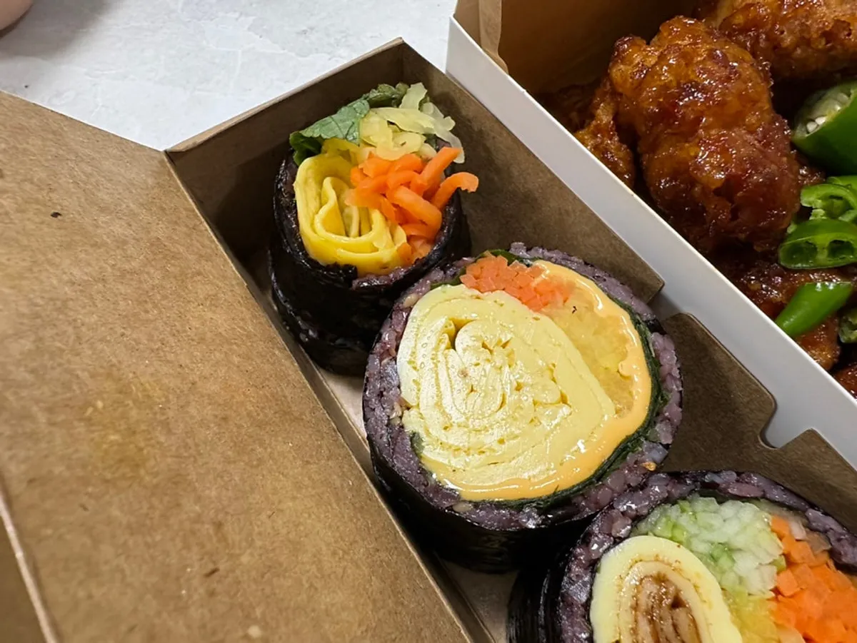 Vegetables and egg omelet strips inside Halls Gimbap