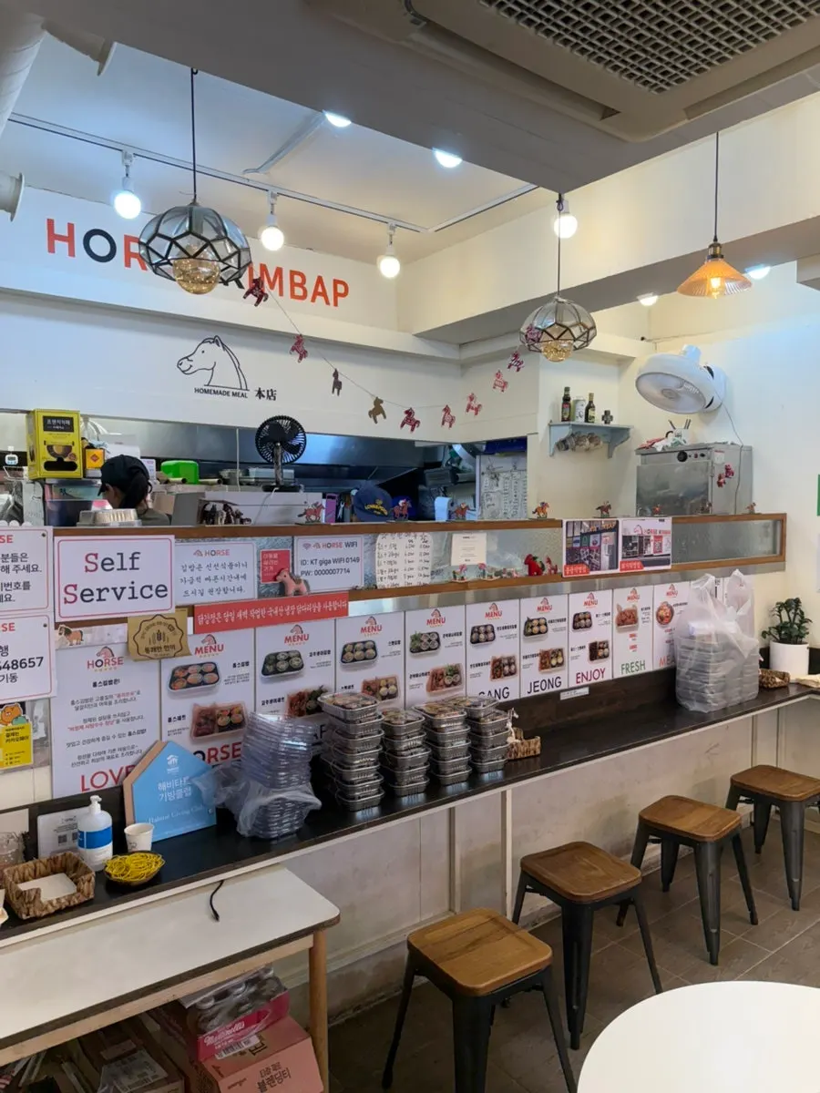 Kitchen scene of staff making gimbap nonstop