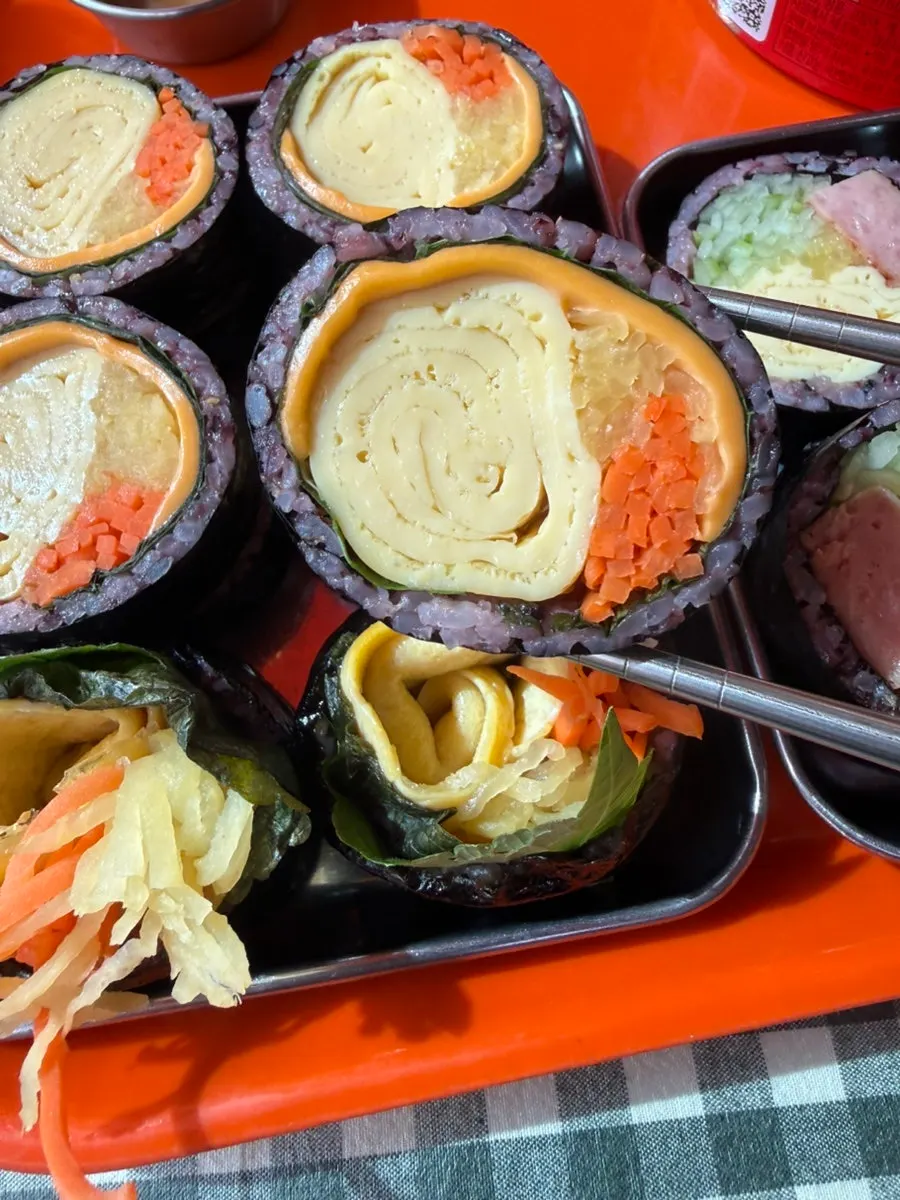 A roll of spam gimbap from Halls Gimbap Main Branch