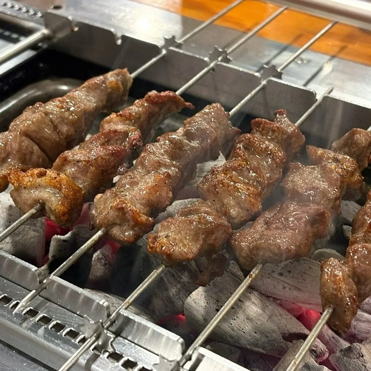 Grill packed full of lamb skewers