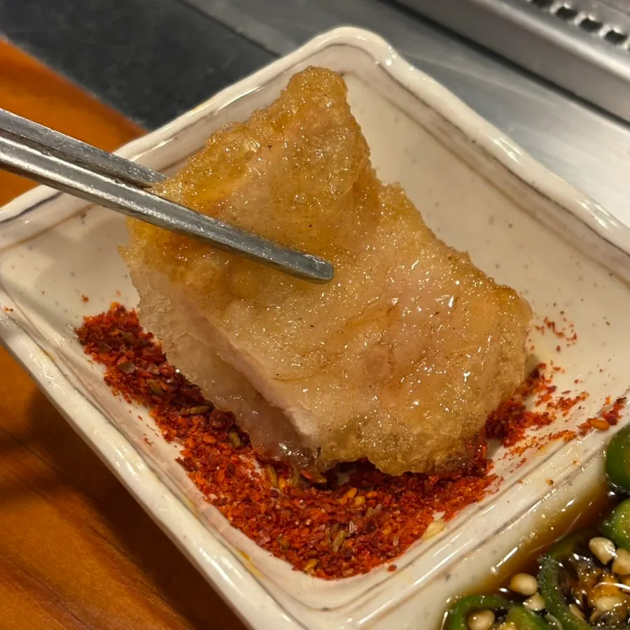 Sticky rice guobaorou dipped in cumin powder