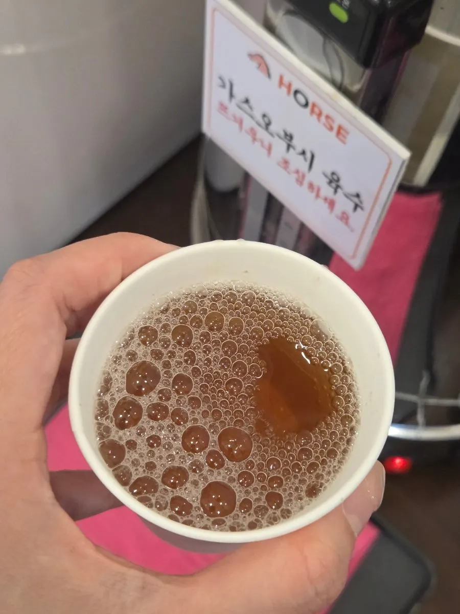 Bonito broth served alongside the meal