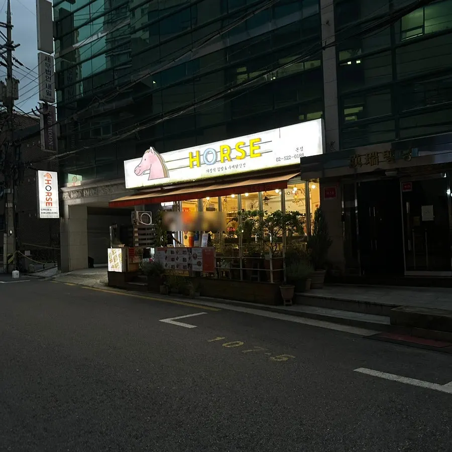 Alley behind Gyodae Station Exit 1 leading to Halls Gimbap