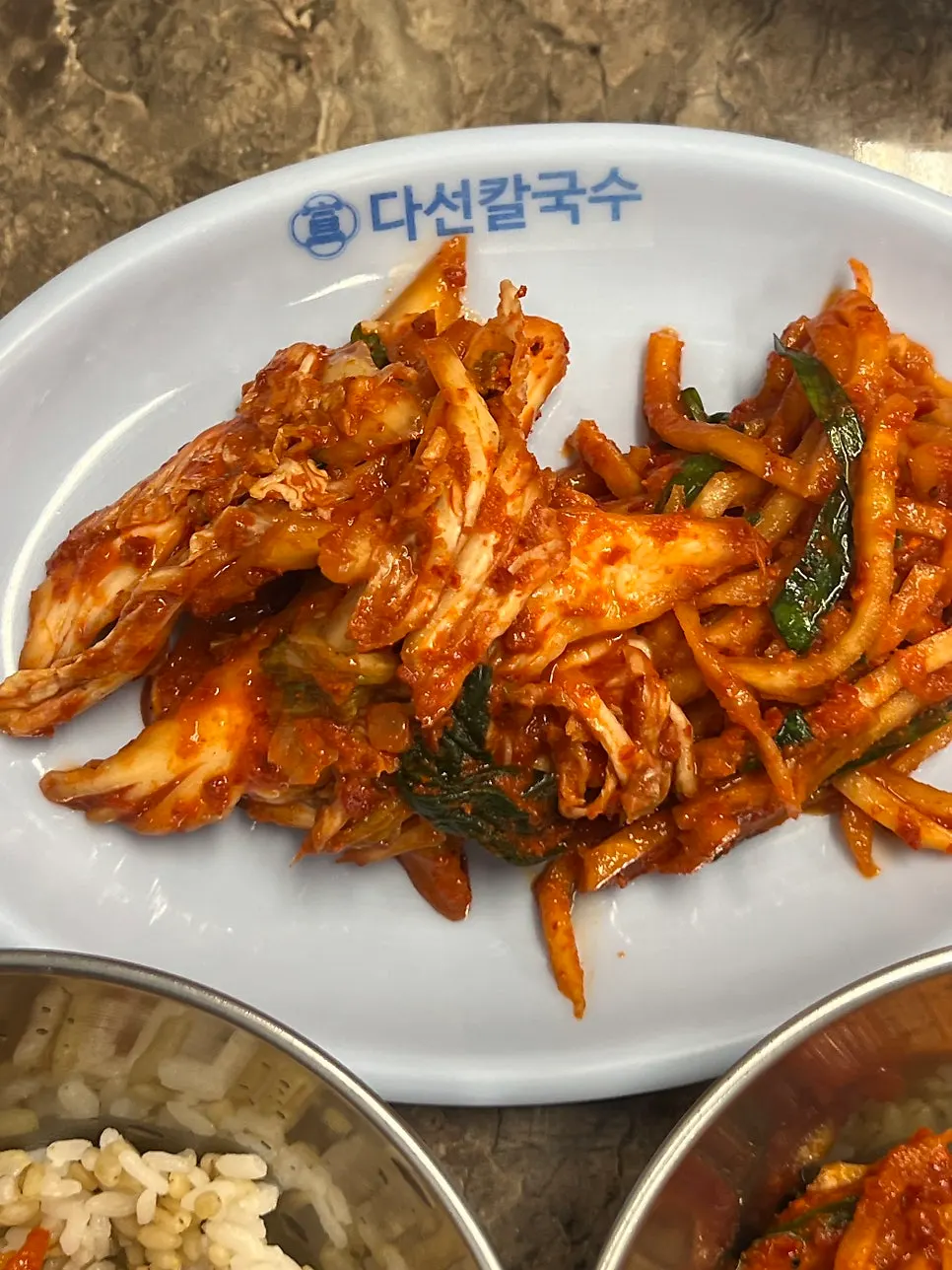 Jang kalguksu noodles coated in broth
