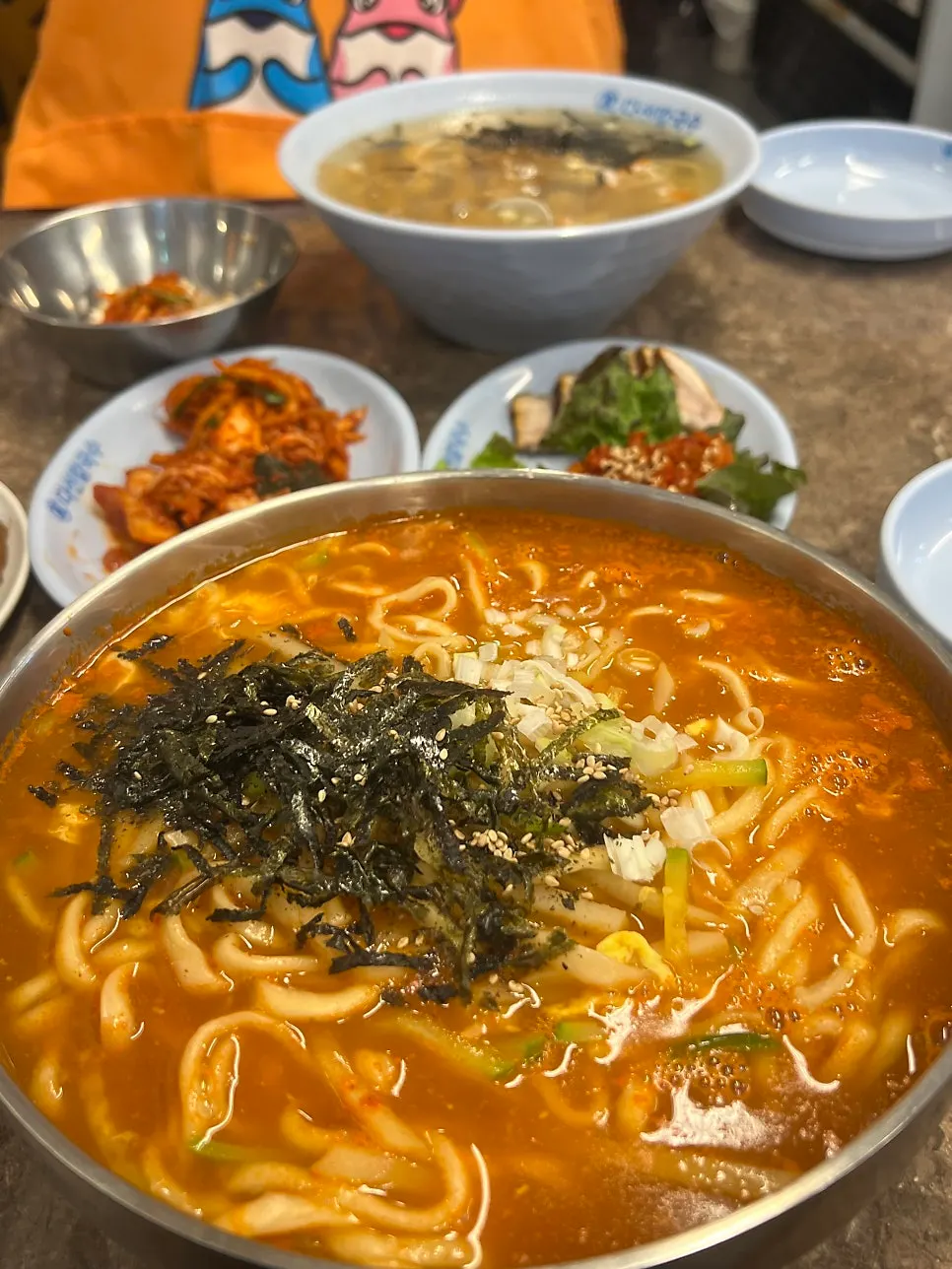 A full spread of bossam kalguksu set, suyuk, and jang kalguksu