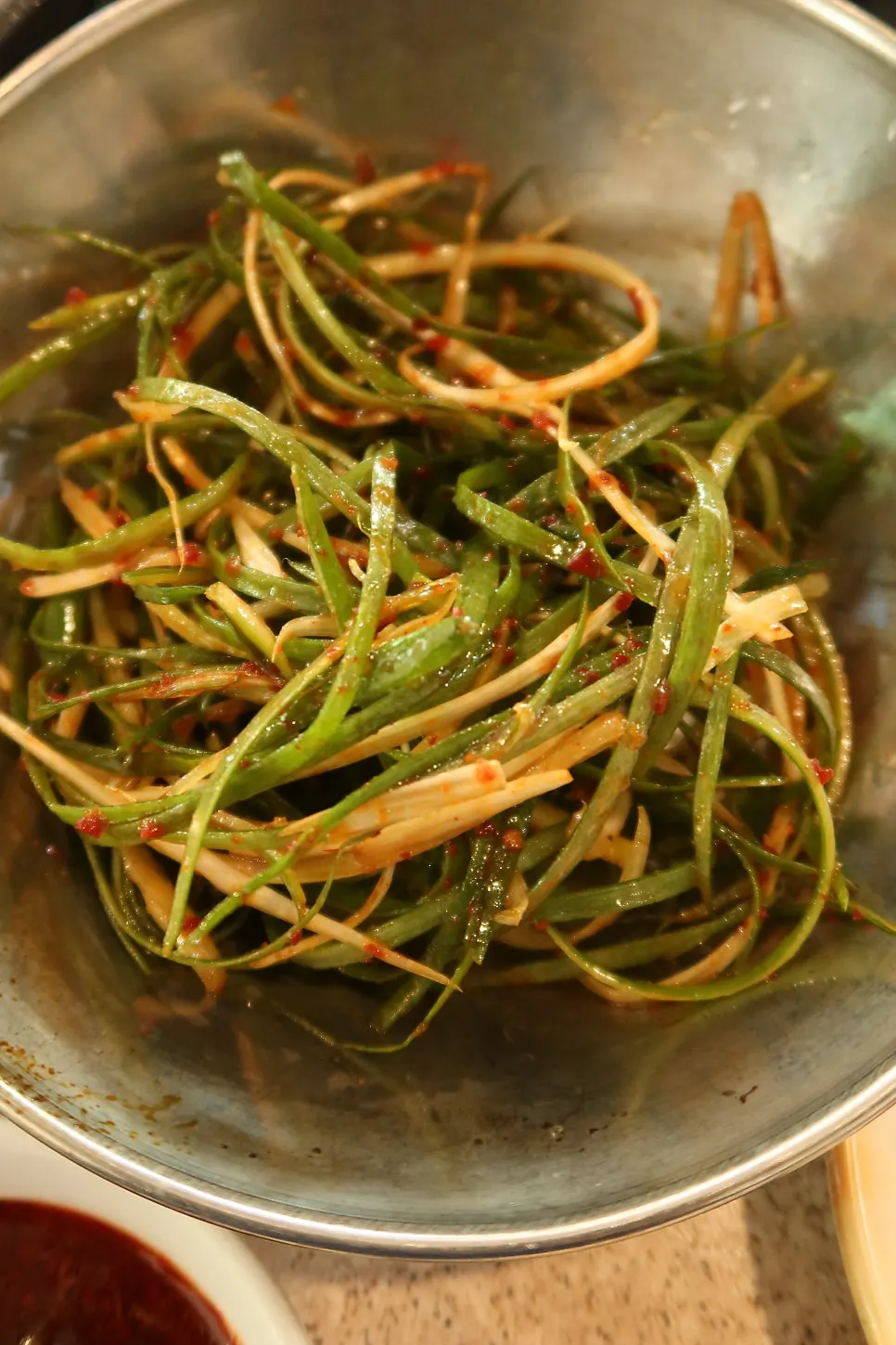A full spread of side dishes at Gyodaepae