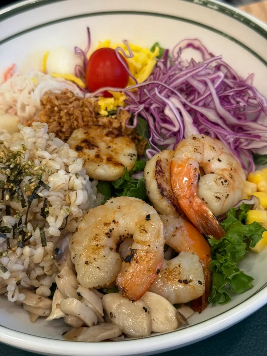 Scallop and shrimp poke with furikake-sprinkled rice and grilled mushrooms