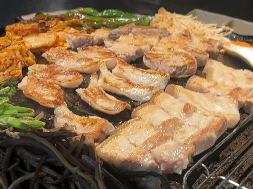 Wine and a pot-lid meat spread