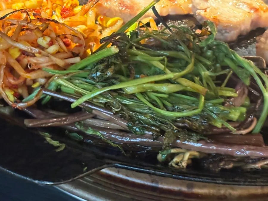 Grilled pork and shishito peppers