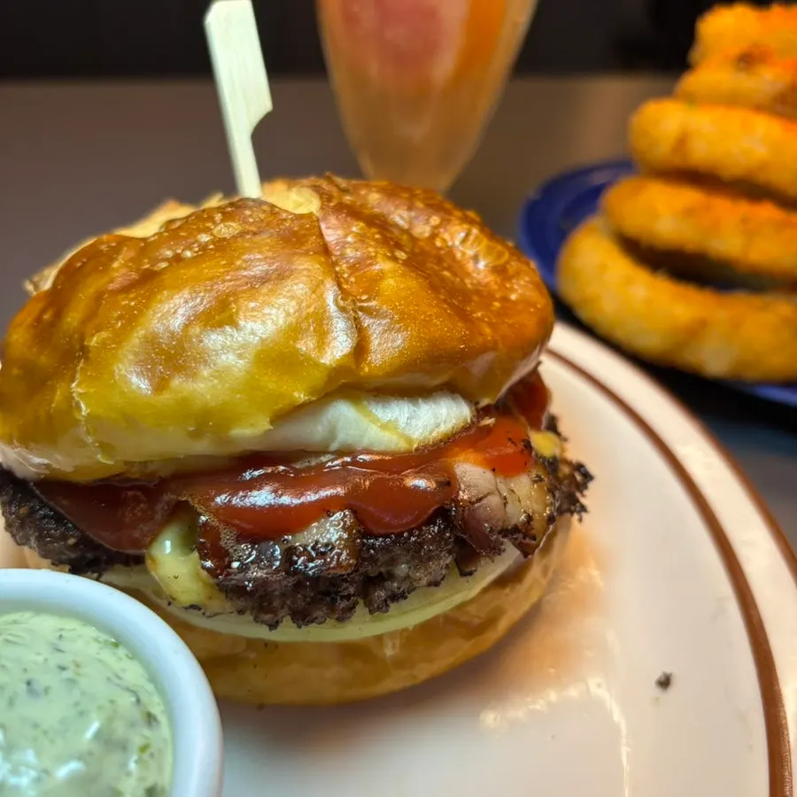 Nutty handmade burger on a pretzel bun