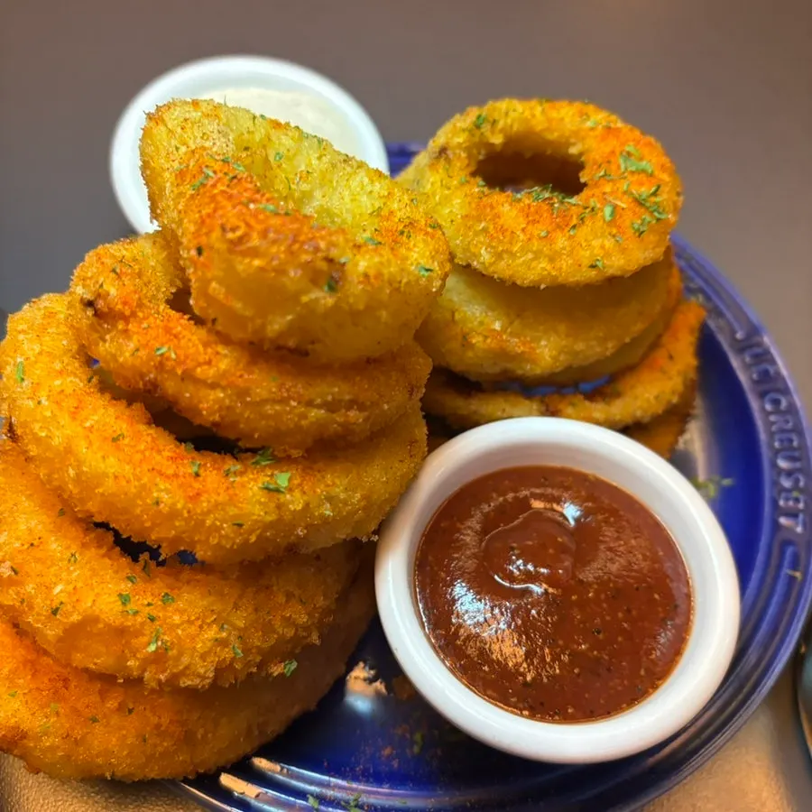 Fried onions served with a handmade burger
