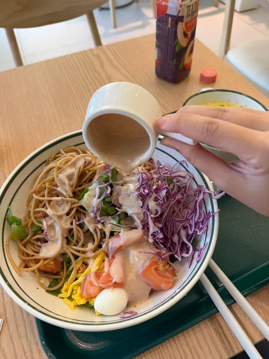Raw salmon bibim poke mixed with mentaiko wasabi mayo
