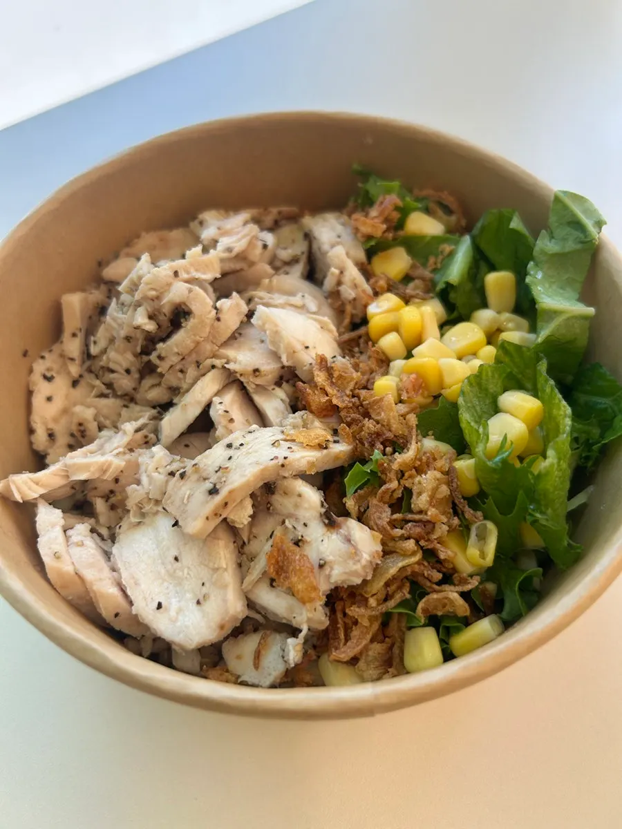Crispy-outside-juicy-inside grilled chicken thigh protein bowl
