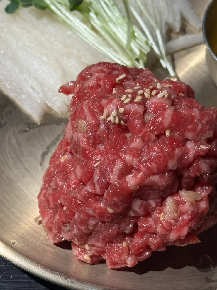 Korean beef yukhoe topped with an egg yolk