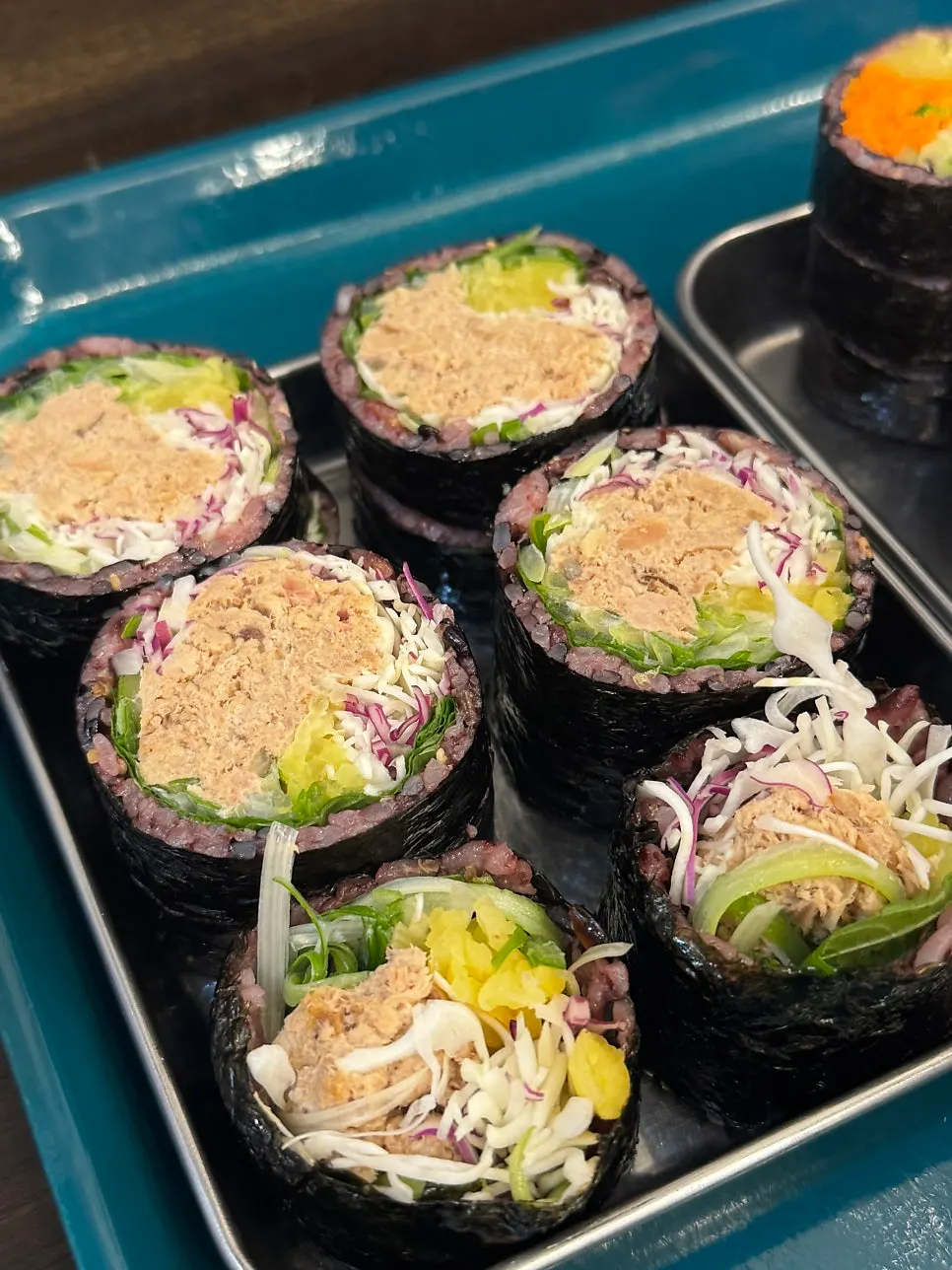 Ordered gimbap and dakgangjeong set on the table