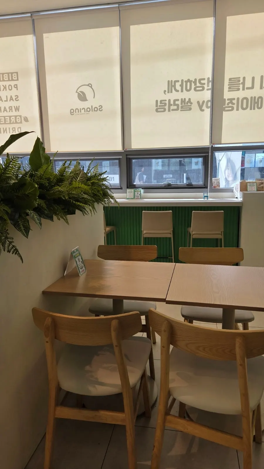 Open kitchen where food preparation is visible