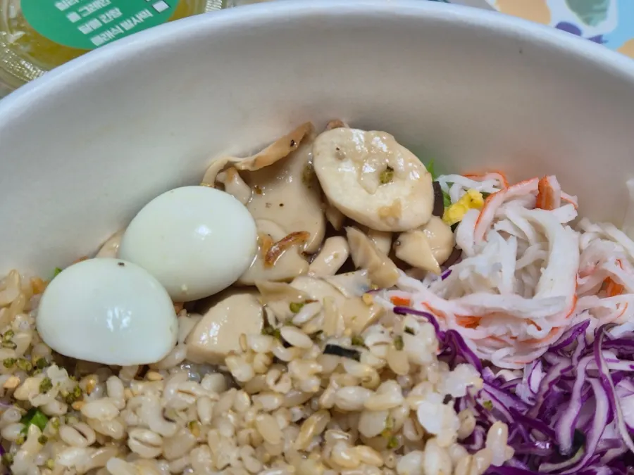Poke ingredients including brown rice, quail eggs, and mushrooms