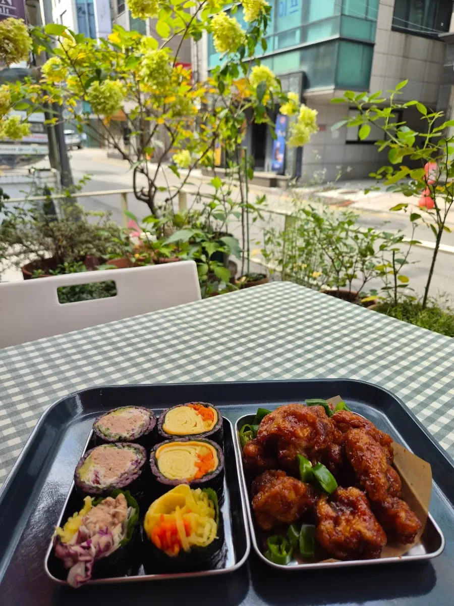 Outdoor terrace seating at Halls Gimbap