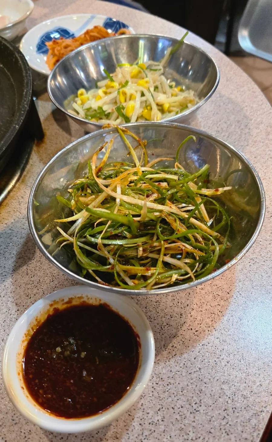 Basic side dishes including bean sprouts and green onion salad