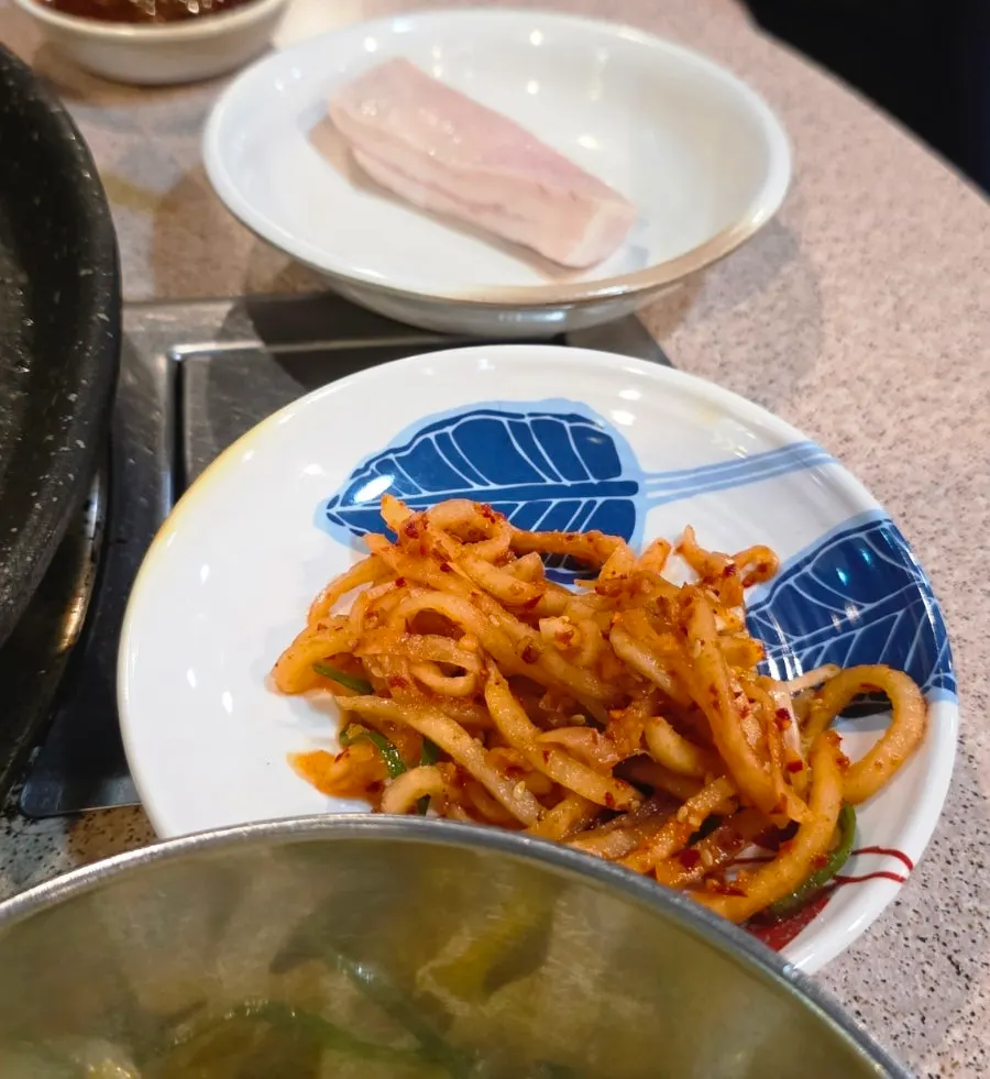 Plate of side dishes ready to be grilled