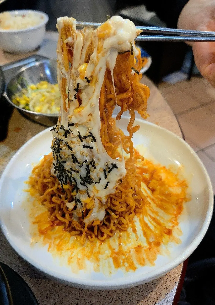 Buldak noodles topped with corn cheese