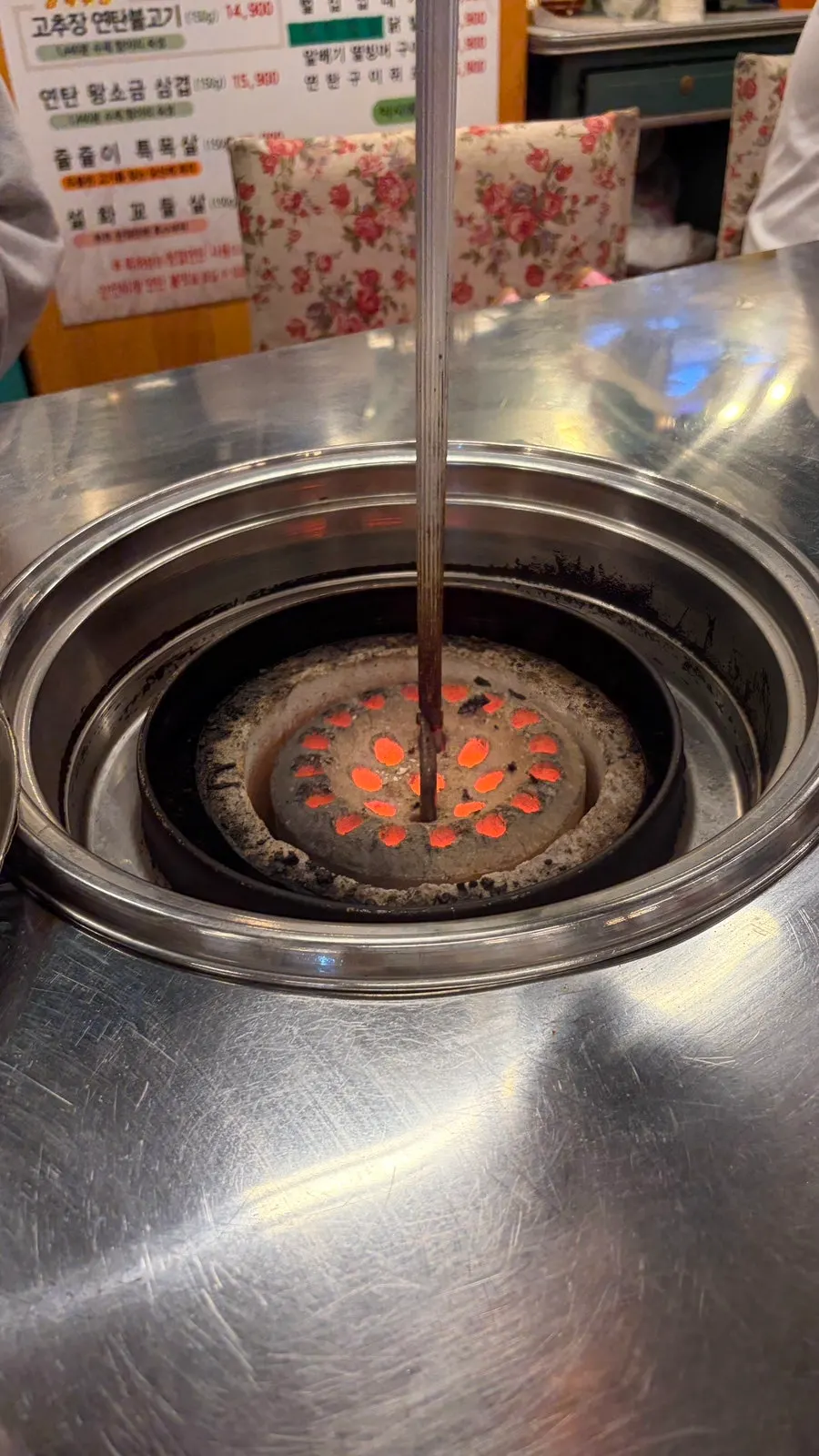 Charcoal fire brought to the table