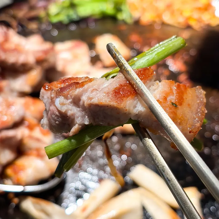 Pork belly with skin attached, served with minari