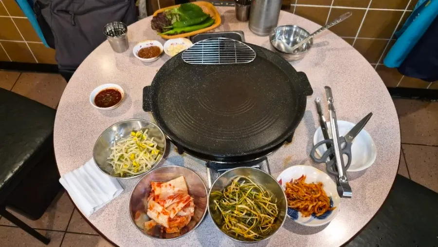 Basic side dishes served in stainless bowls